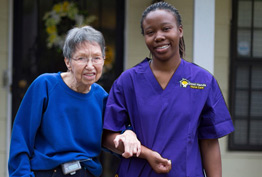 good hands care giver with client